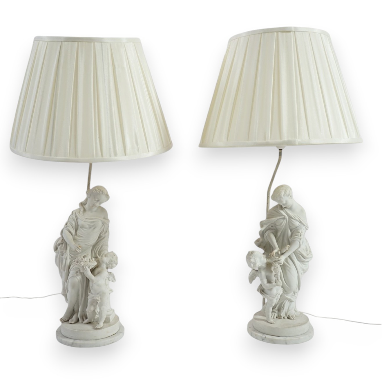 A pair of 19th century French bisque groups, depicting the seasons, Summer and Winter